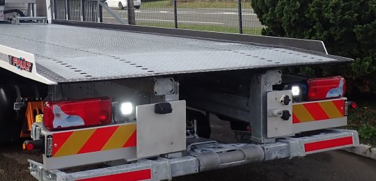 Two work lights fitted at the rear of the equipment