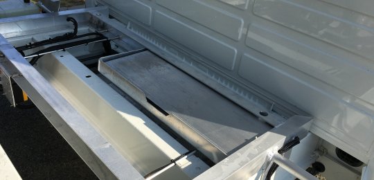 Two small aluminium ramps 700x250 mm with support on equipment for loading vehicles on the platform with trolleys