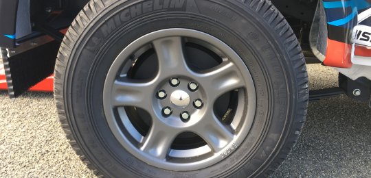 Replacement of the original 4 wheels with ALUMINUM wheels reinforced in GREY