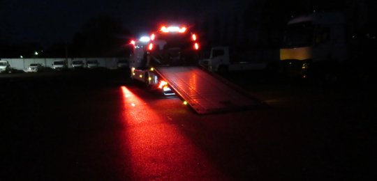 A red LED projector to delimit a safety corridor on the driver's side