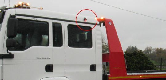 A red LED projector to delimit a safety corridor on the driver's side