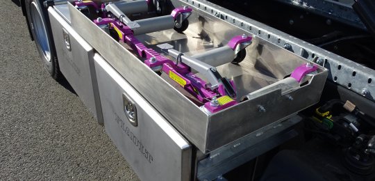 An open support on the equipment for two wheel dollies type "GO-JACK 5000" (without dollies)