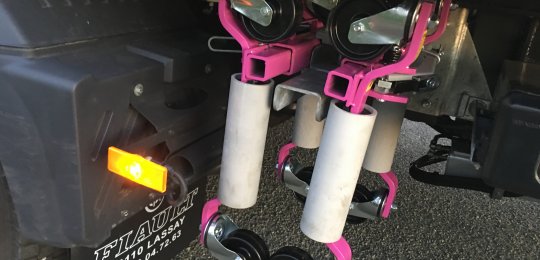 An open support on the equipment for two wheel dollies type "GO-JACK 5000" (without dollies)