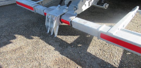 A  removable part adaptable to the Second Car Carrier with 2 pins and vertical spades for planting in the ground by lowering the Second Car Carrier